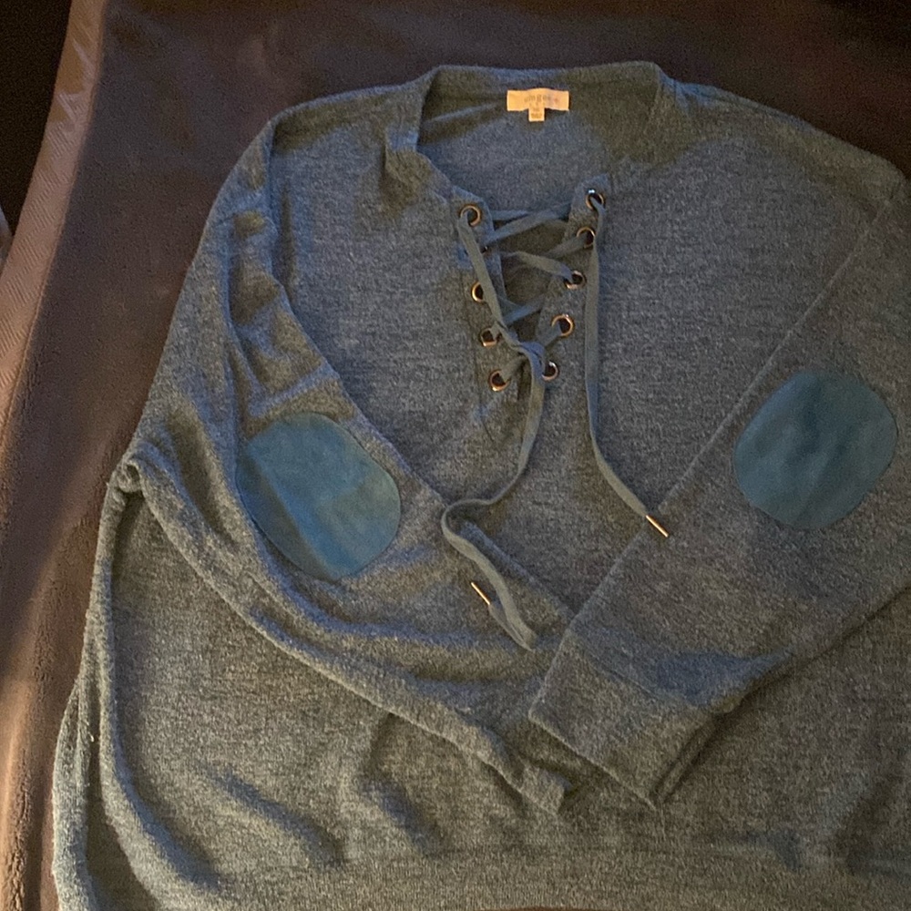 Teal Sweater with tie front. Elbow patches add a cute detail